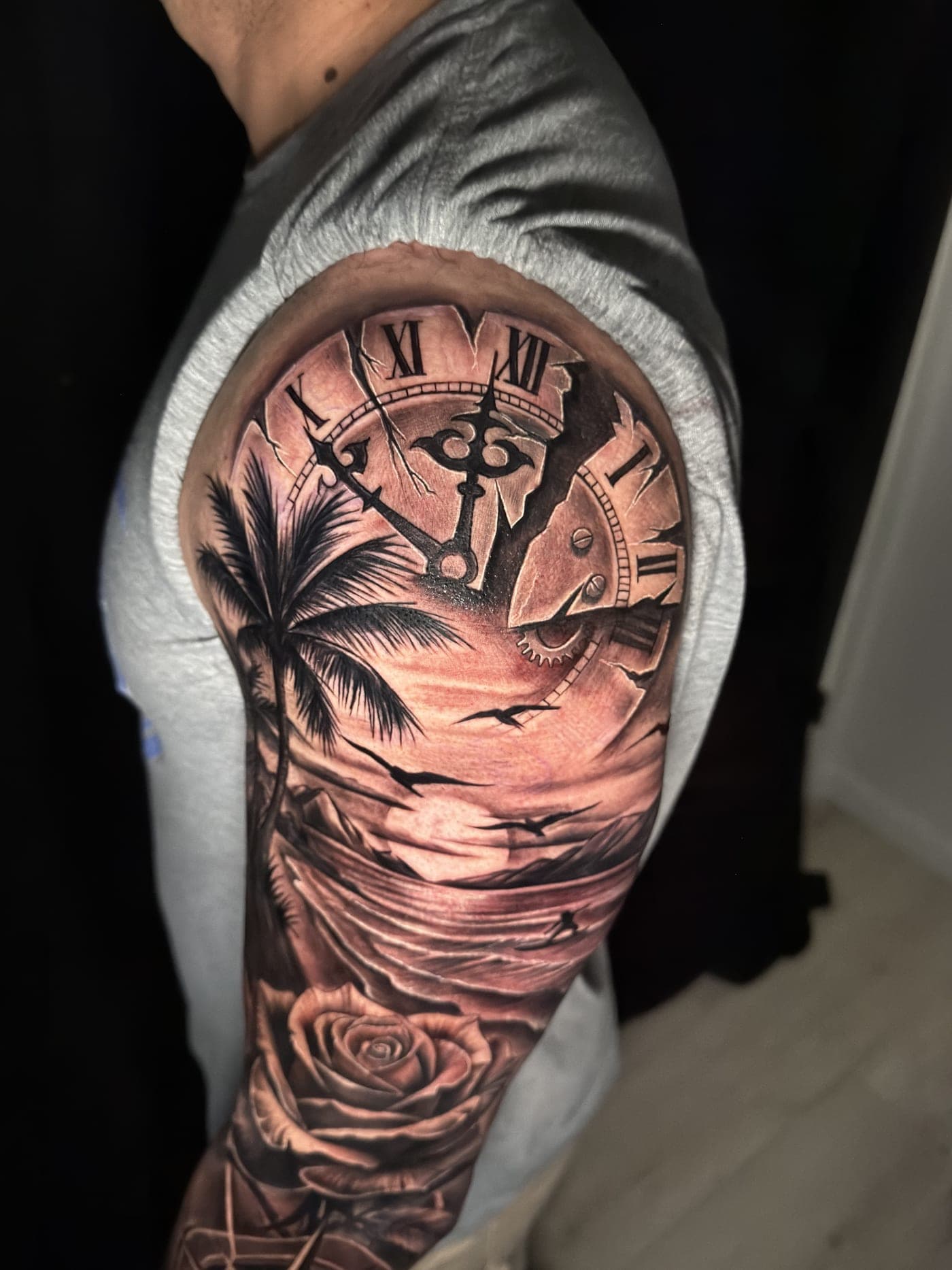 Clock with palms and rose sleeve detail
