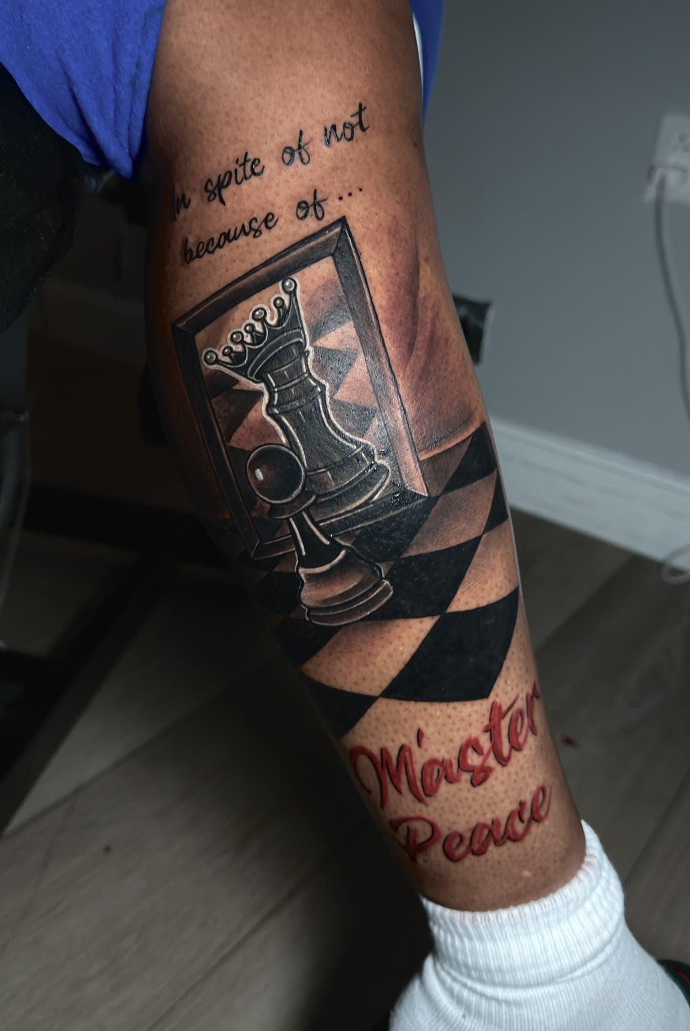 Chess piece with quote Master Peace on calf