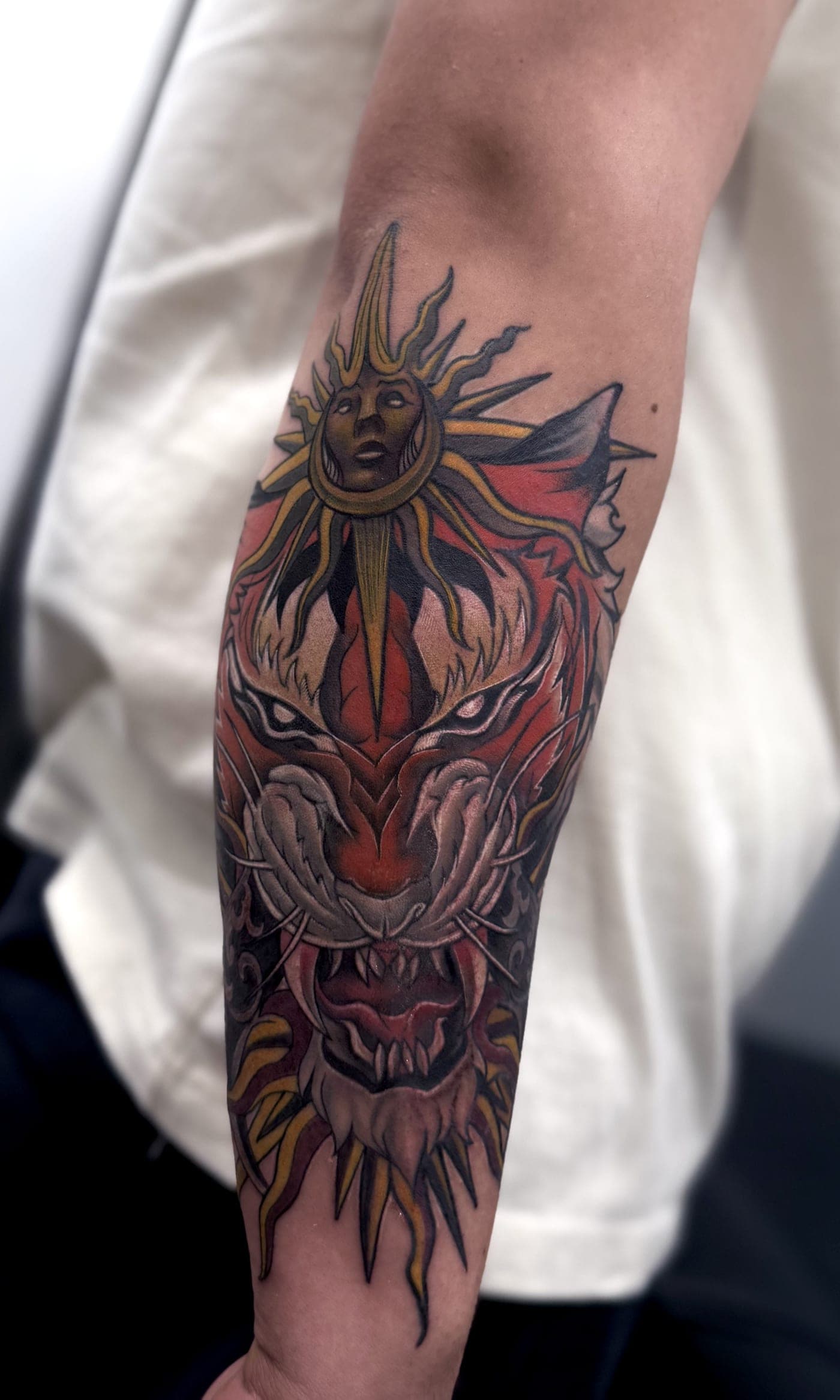 Tiger with sun neo-traditional color tattoo
